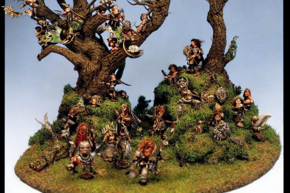 Miniature fantasy diorama with lively characters around two large trees