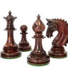 Intricate surreal chess pieces with natural motifs