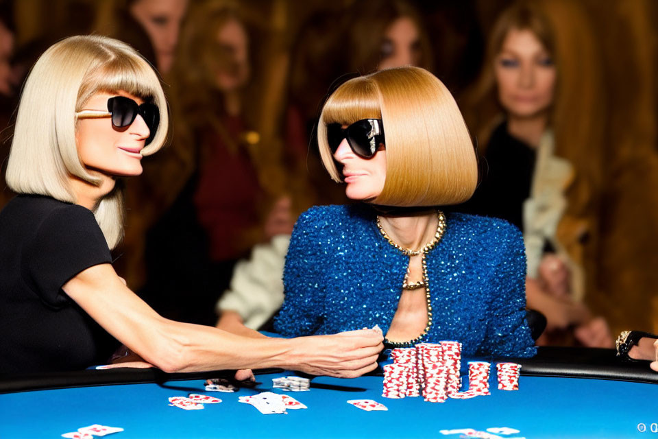 Two women with bob haircuts and sunglasses at a poker table with piles of chips