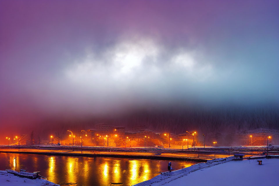 Snow-covered river banks under glowing street lamps on a tranquil winter evening