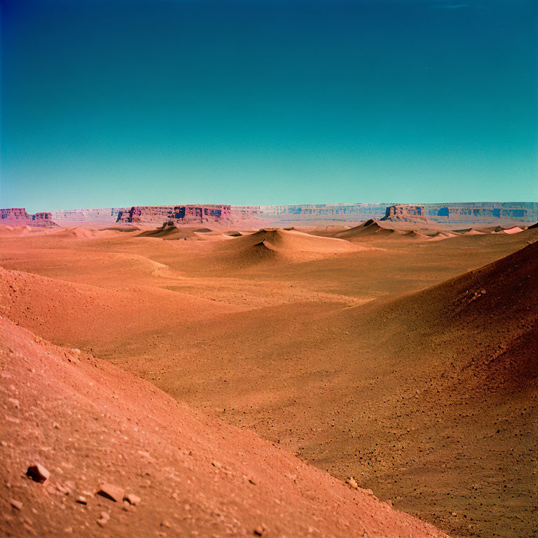 Reddish-Brown Martian Landscape with Sand Dunes and Cliffs