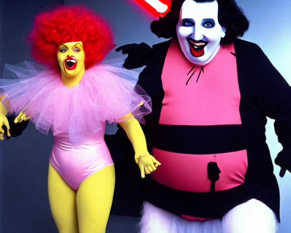 Colorful clown costumes holding hands with red lightsaber pose