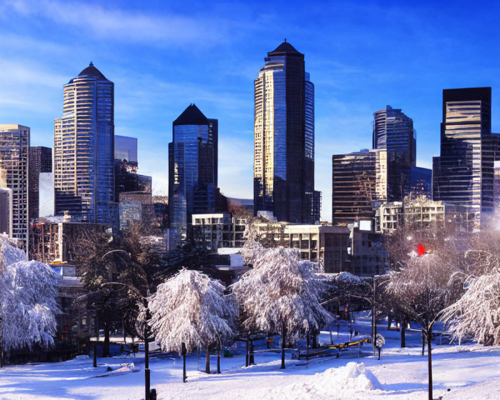 Snow-covered winter cityscape with modern skyscrapers and trees.