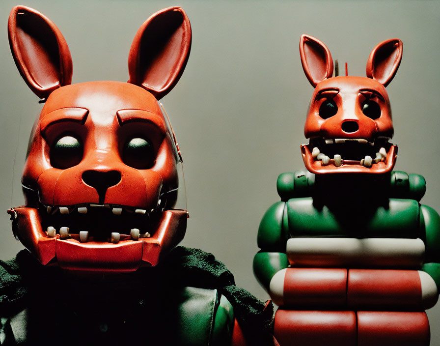 Two Large Cartoonish Animatronic Rabbit Heads with Exaggerated Features
