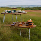 Modern wooden picnic table in serene outdoor setting