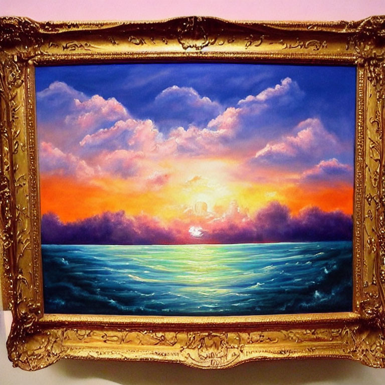 Colorful sunset painting in gold frame: ocean, pink and orange clouds.