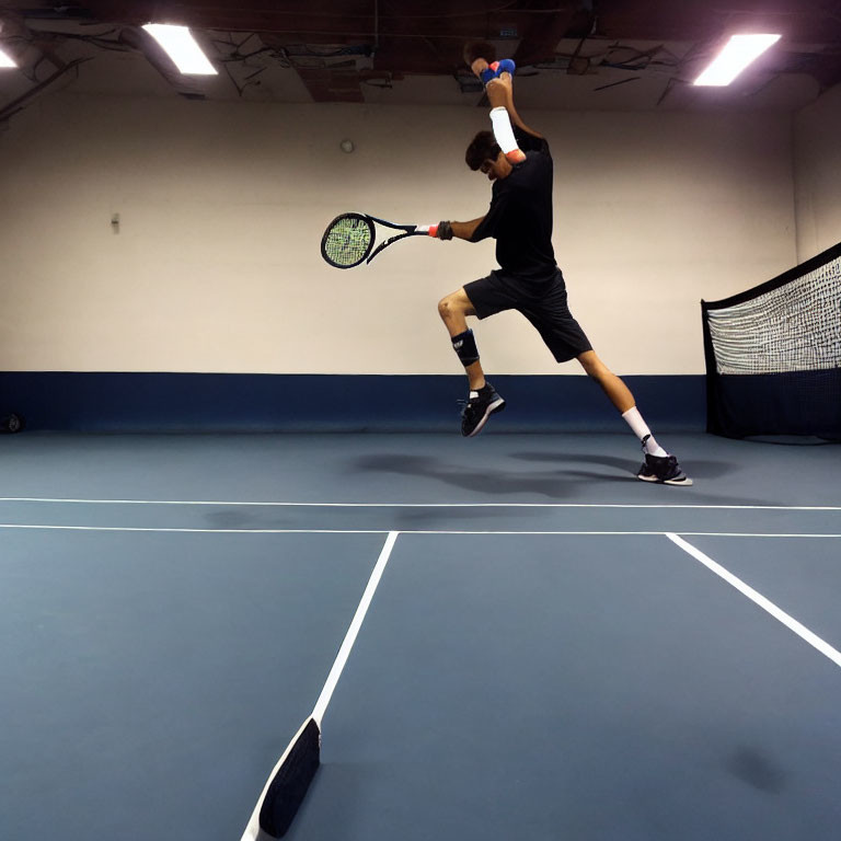 Athlete in action on indoor tennis court showcasing agility and focus