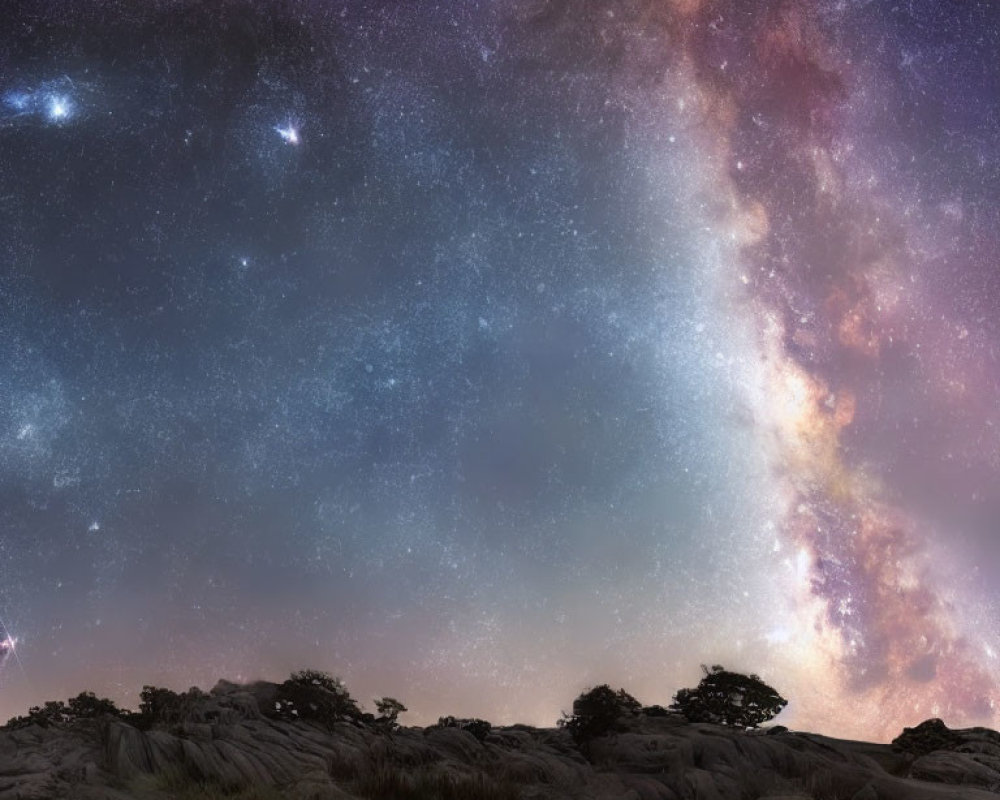 Starry Night Sky with Milky Way Galaxy over Rocky Terrain