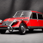 Vintage Red Citroën 2CV with Corrugated Body and Chrome Grille