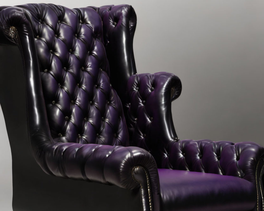 High-Back Armchair with Deep Purple Leather Upholstery and Ornate Wooden Legs