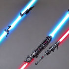 Three illuminated lightsabers with blue, green, and red blades on grey background