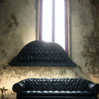 Black Tufted Sofa in Room with Gothic Windows, Purple Carpet, Aged Walls, and Golden