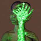 Green Dotted Projection on Hand and Face Against Pink Background