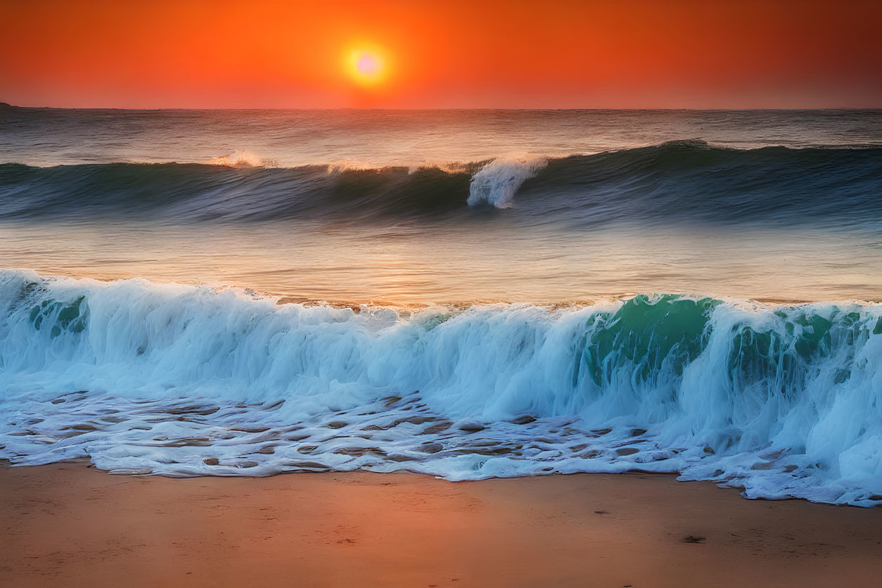 Vibrant orange sunset over crashing ocean waves