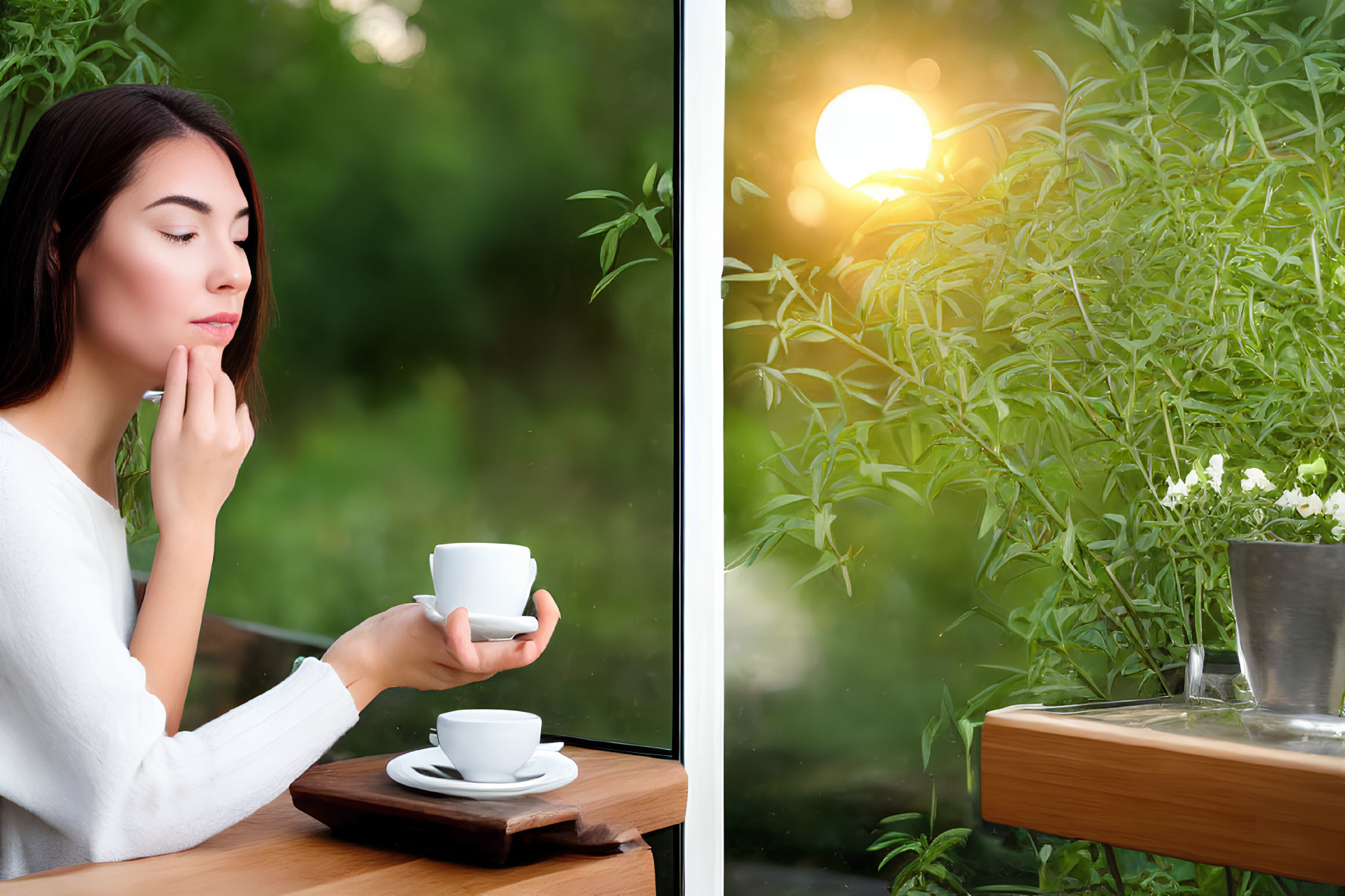 Woman in white sweater savoring coffee by window at sunset