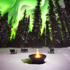 Snowy trees and chairs around fire pit under aurora borealis