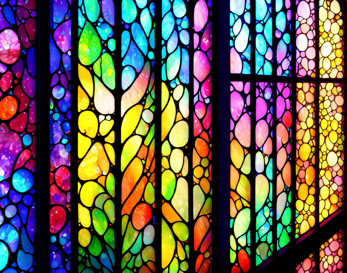 Colorful Stained Glass Windows Featuring Leaf and Circular Patterns