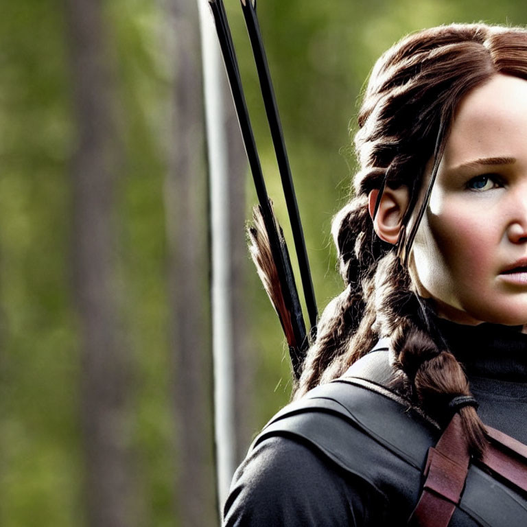 Focused woman with braided hair carrying bow and arrows in nature.