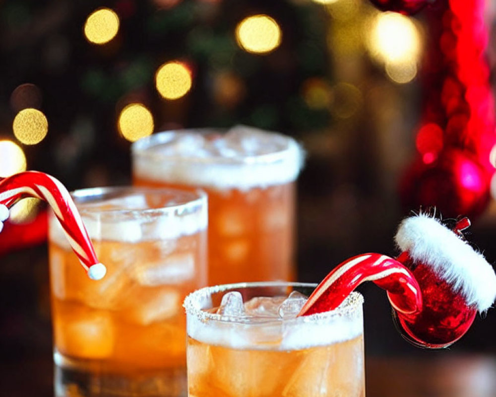 Amber-colored Drinks with Candy Canes on Festive Background