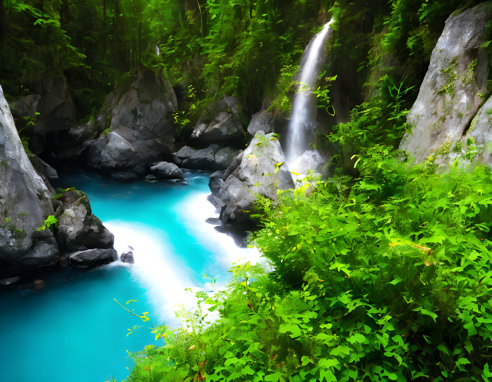 Tranquil turquoise stream in rocky landscape with waterfall