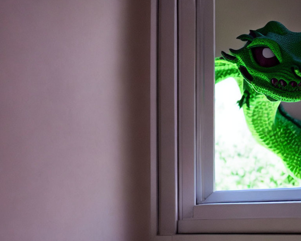 Green Dragon Puppet Peering Through White-Framed Window