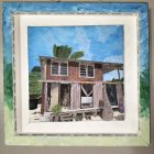 Colorful village scene in Van Gogh style within wooden frame, room with parquet flooring