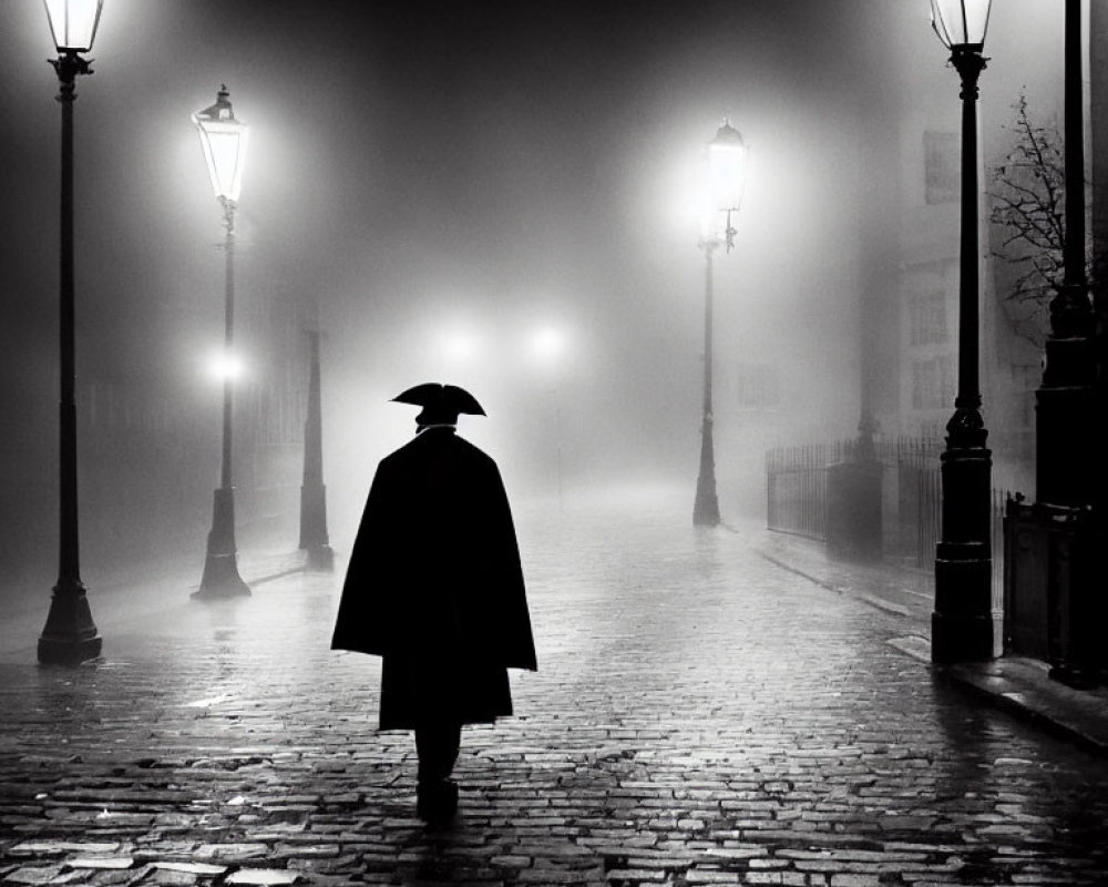 Mysterious figure in cape and hat on foggy cobbled street
