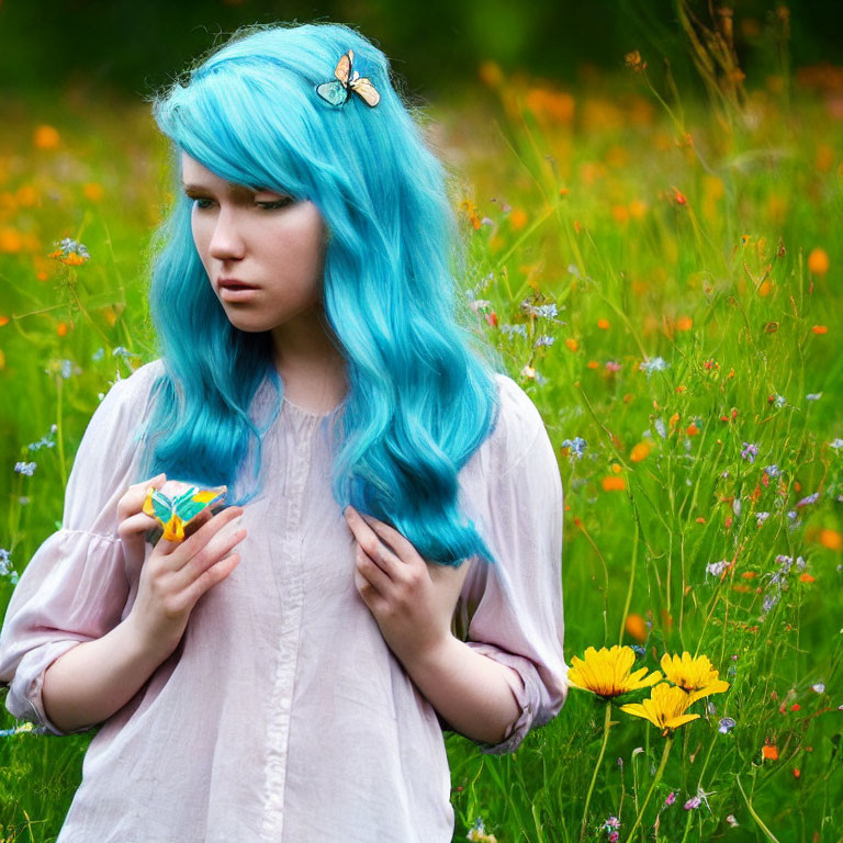 Vibrant blue hair with butterfly clip in colorful flower field