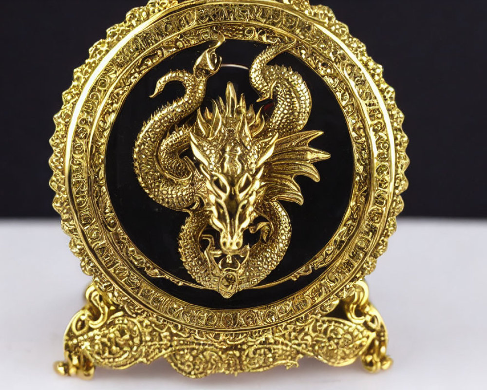 Gold Dragon Embossed on Black Circular Background with Golden Frame