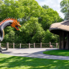Large Orange-Spiked Dragon Model in Green Park Setting