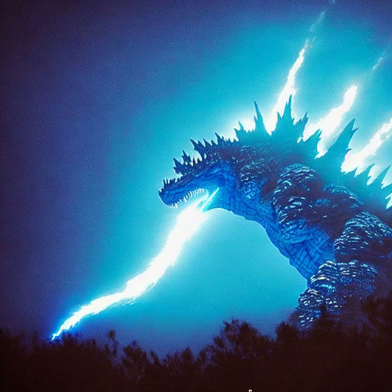 Blue Godzilla emitting energy beam in dark backdrop