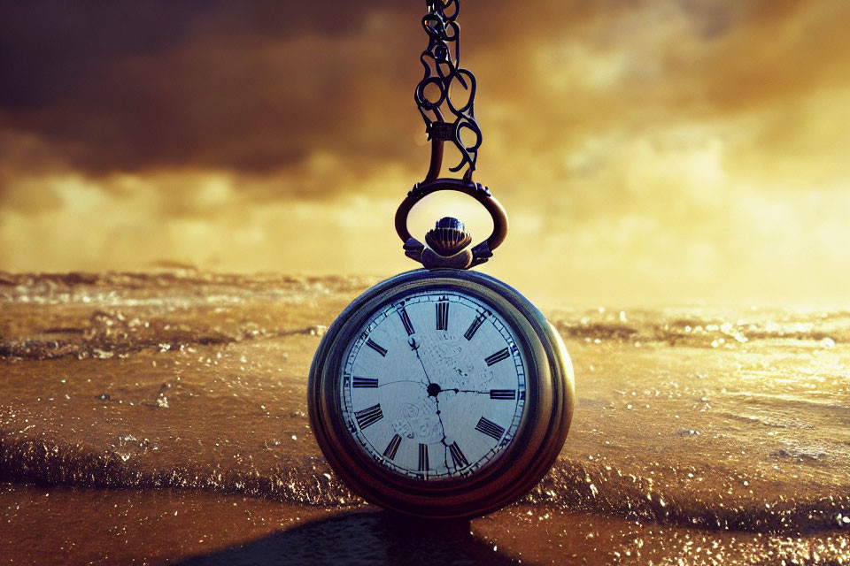 Antique Pocket Watch on Chain with Ocean Sunset Background
