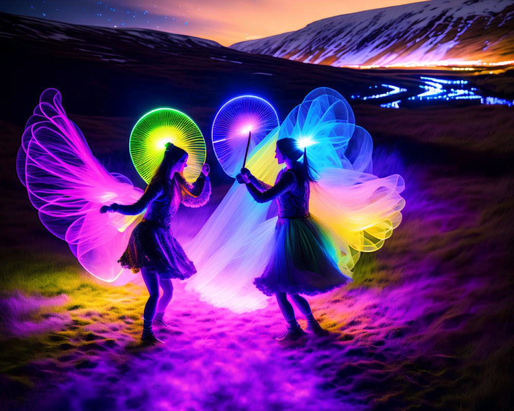 Colorful illuminated wings: Two people with light sticks in picturesque field