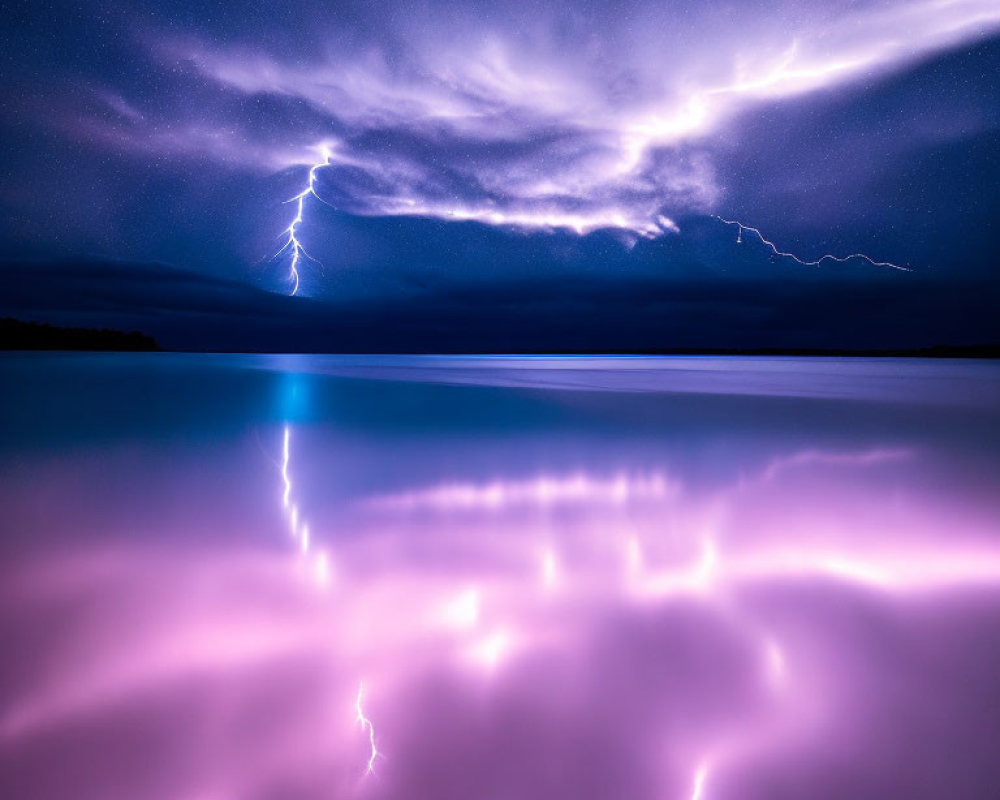 Intense lightning storm reflected on water with purple clouds