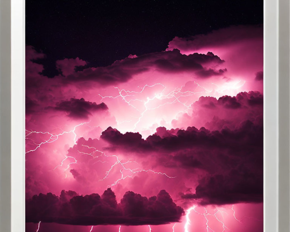 Vibrant pink lightning bolts in dramatic night sky frame