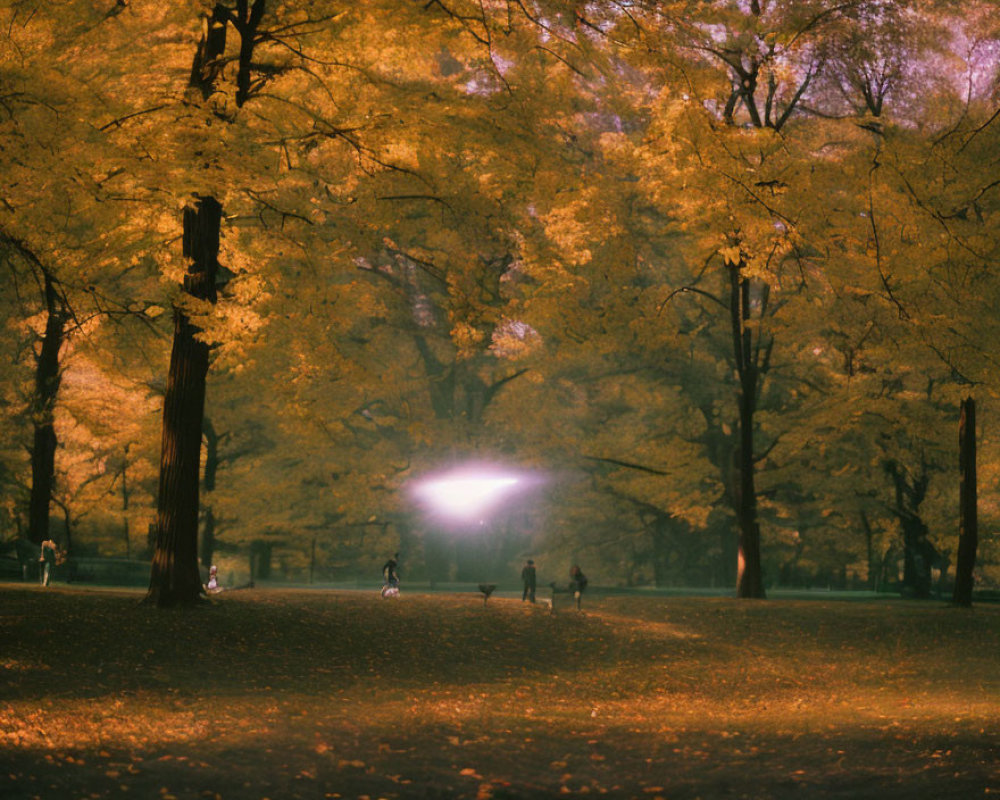 Autumn Park Scene with Golden Leaves and Silhouettes