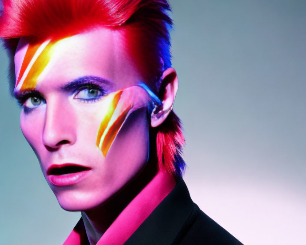 Colorful lightning bolt makeup on person with red spiked hair in black jacket