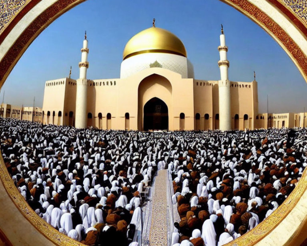 Crowded gathering in white attire facing mosque with golden dome and twin minarets