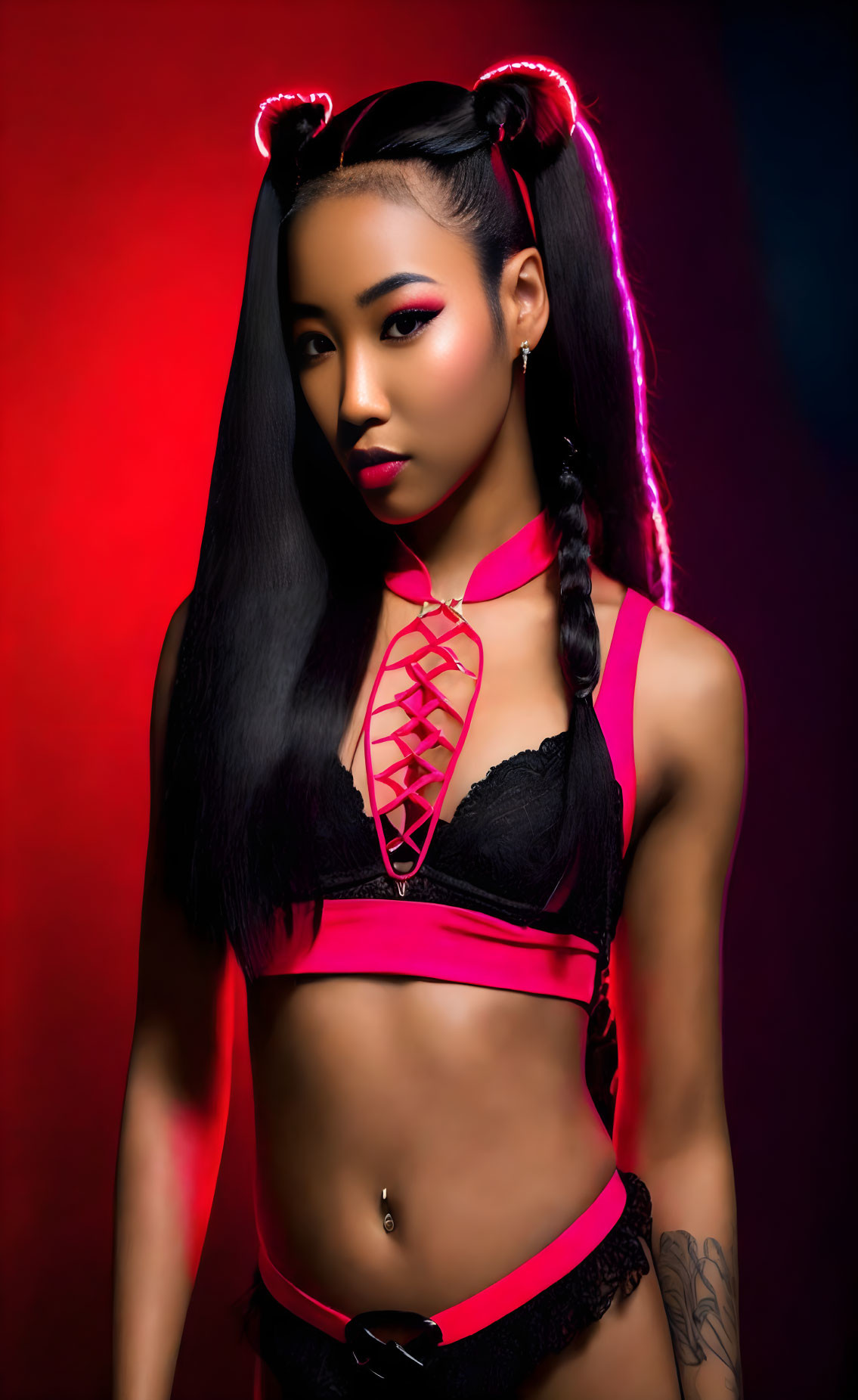 Glowing pink pigtails woman in black and pink outfit with tattoo on left arm on red