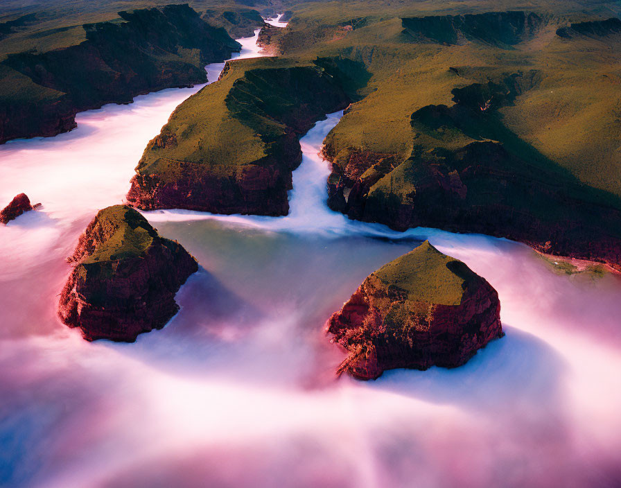 Misty Sunrise Aerial View of Verdant Cliffs and River Valleys
