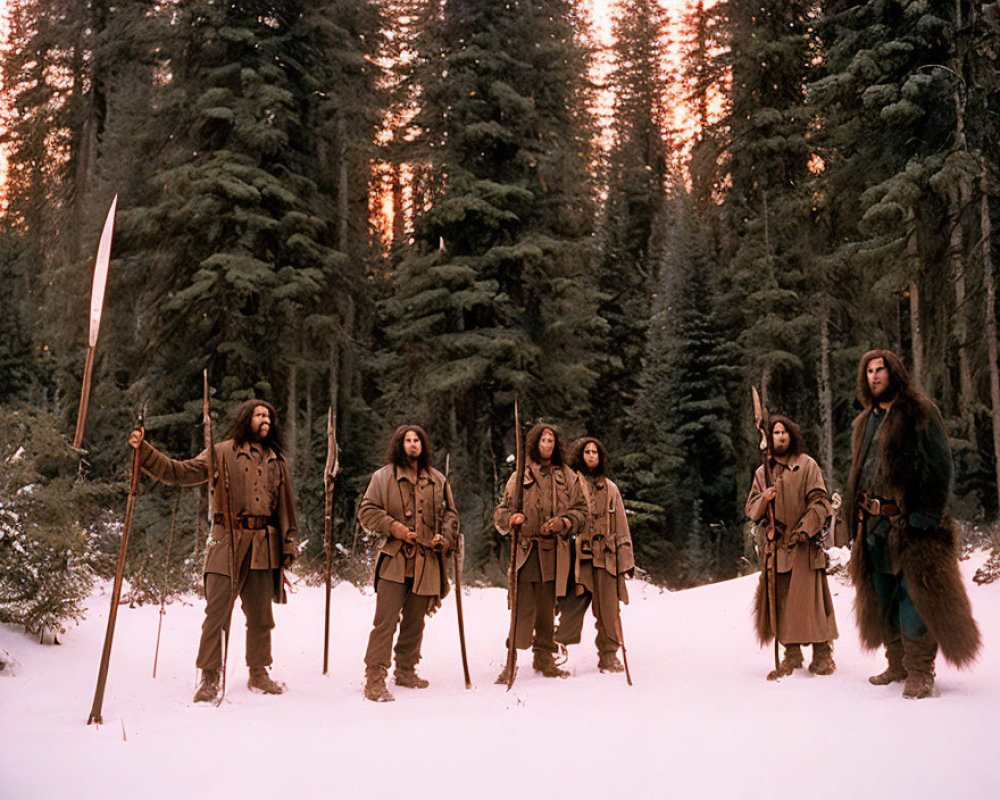 Indigenous people in traditional clothing with bows and spears in snowy forest at dusk
