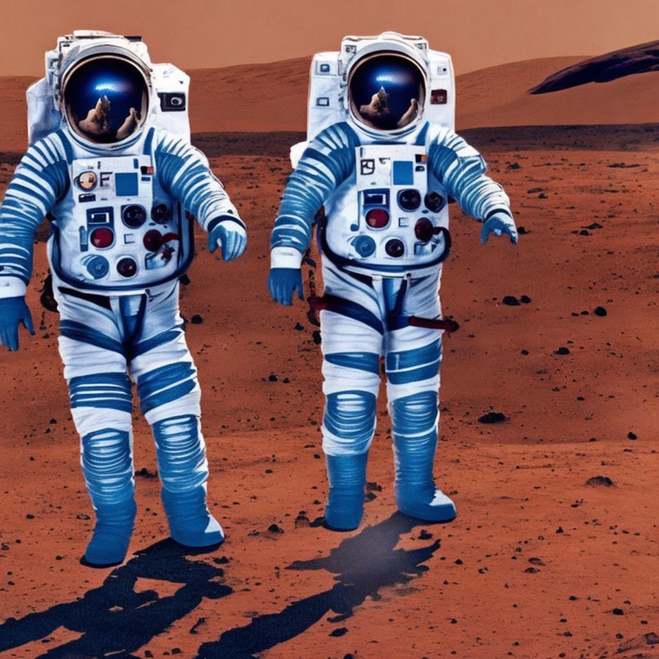 Astronauts in Blue-Spotted Space Suits on Mars-Like Terrain