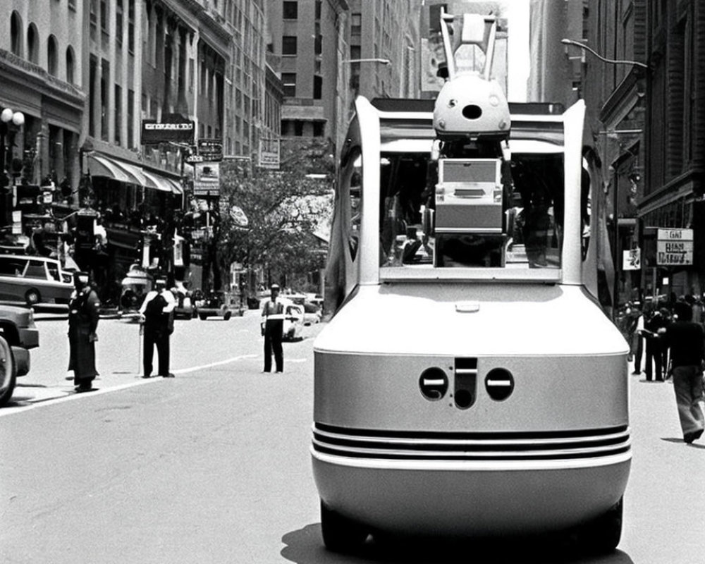Monochrome photo: Bus with cartoon rabbit driving in urban setting