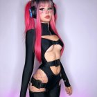Futuristic woman in black and white bodysuit with pink hair and cat-like ears