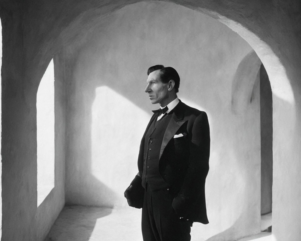 Man in Classic Tuxedo in Dramatic Architectural Setting