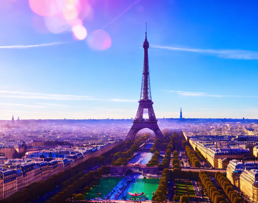 Eiffel Tower in Sunlight with Blue Skies and Cityscape View