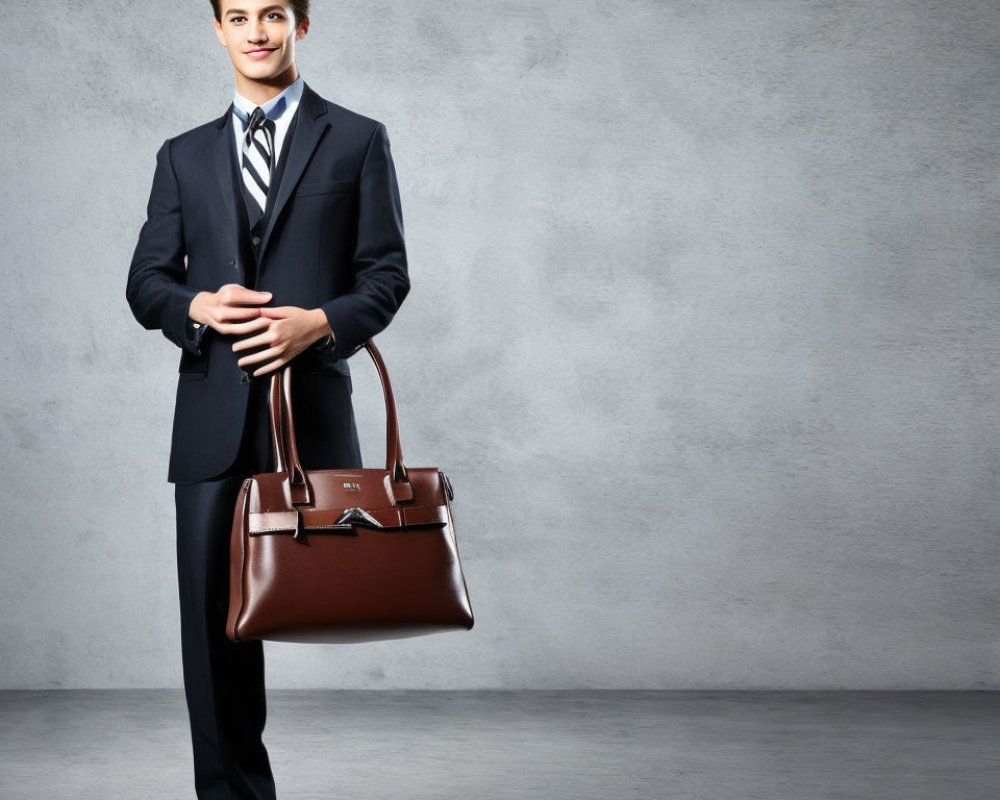 Professional in Dark Suit with Leather Briefcase on Gray Background