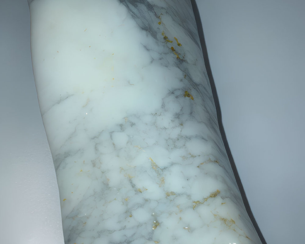 Intricate White and Gray Marble Object with Gold Veins