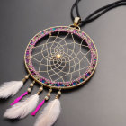 Colorful Dreamcatcher with Beads and Feathers on Grey Background