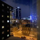 Futuristic nighttime cityscape with neon-lit buildings
